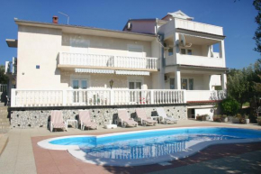 Family friendly apartments with a swimming pool Barbat, Rab - 4951